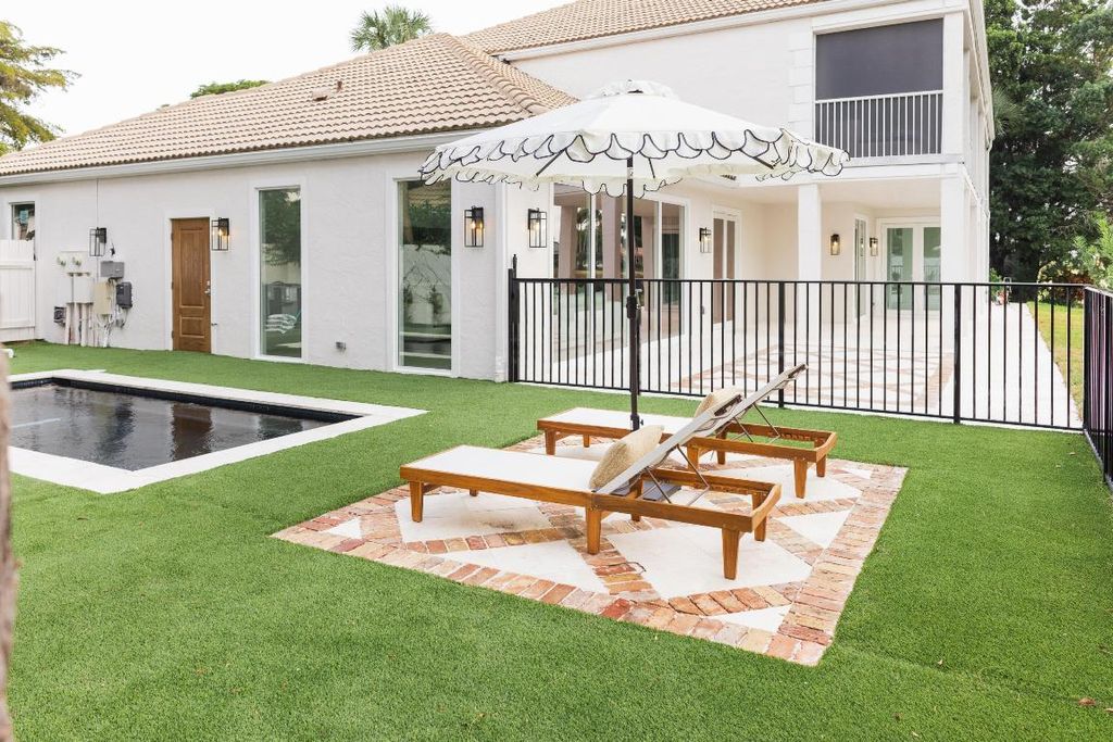 Photo of 11845 Pebblewood Drive, Wellington, FL 33414 (MLS # R11150140)