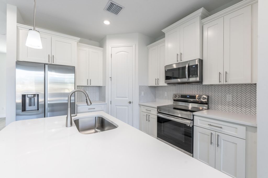 Photo of 532 SW Sansom Lane, Port Saint Lucie, FL 34953 (MLS # R10980247)