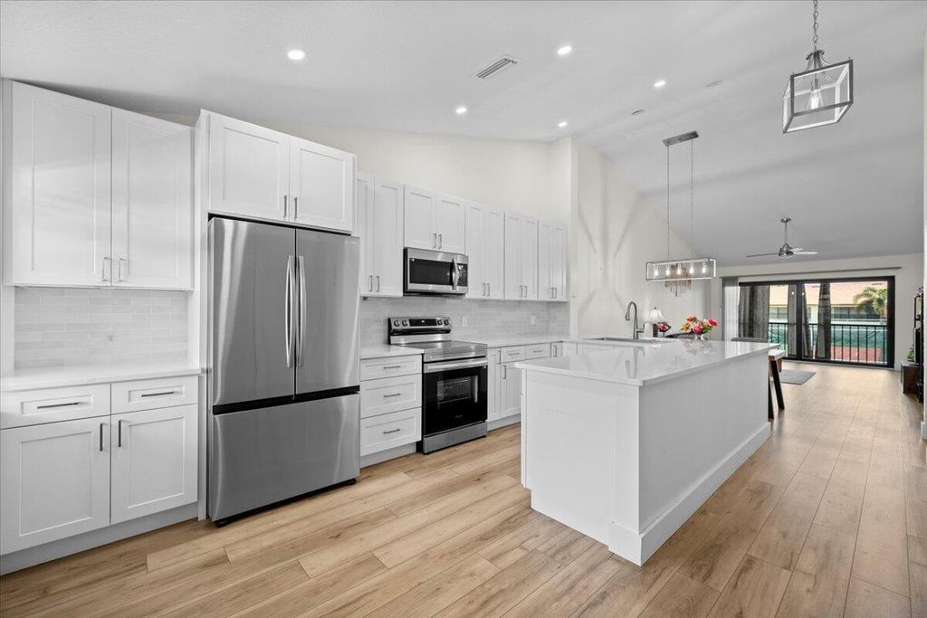 Photo of 302 Pinecrest Circle #D, Jupiter, FL 33458 (MLS # R11090332)