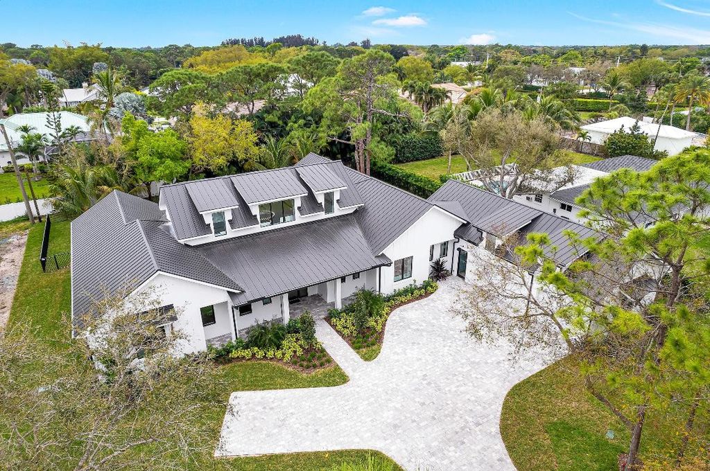 Photo of 5650 Shirley Drive, Jupiter, FL 33458 (MLS # R11066723)