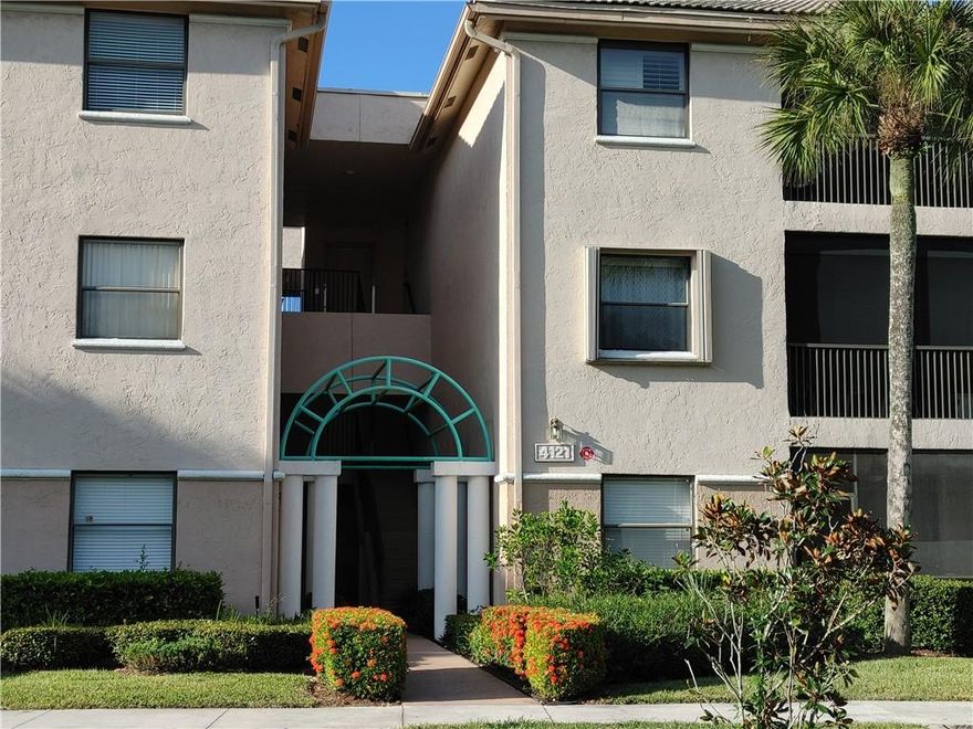 THIS IS IT! A LARGE 2/2 WITH ENCLOSED GLASS PORCH ON THE 1st FLOOR WITH EXTRA GARDEN SPACE OUTSIDE. THE WINDOWS AND GLASS DOORS HAVE NEW ACCORDION HURRICANE SHUTTERS. FULL SIZE LAUNDRY ROOM WITH WASHER AND DRYER AND EXTRA STORAGE SPACE. A WHITE KITCHEN WITH S/S APPLIANCES. FOYER ENTRY, MASTER WALK IN CLOSET, UPGRADED MASTER BATHROOM, WOOD FLOORS, CERAMIC TILE, SPLIT BEDROOMS. THE TOWNSHIP HAS A TON OF AMENITIES LIKE PICKELBALL, TENNIS, RACQUETBALL, BASKETBALL, FULL GYM, AQUATIC CENTER, CHILDREN'S PLAY AREAS, THEATER, BILLIARDS, FULL CLUB HOUSE WITH MONTHLY ACTIVITIES.