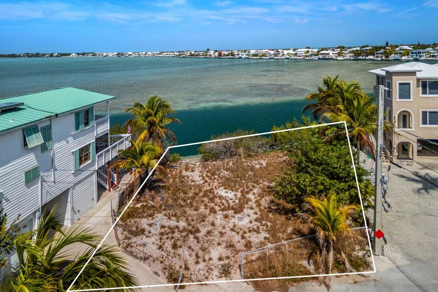 Excellent opportunity to build your dream in paradise. This 6,140 sq foot lot with 70.65 ft. of water frontage has a beautiful open water and ocean view. This is the last lot available in this established subdivision Summerland Cove. Easy access to both the Atlantic Ocean  and the Gulf of Mexico.