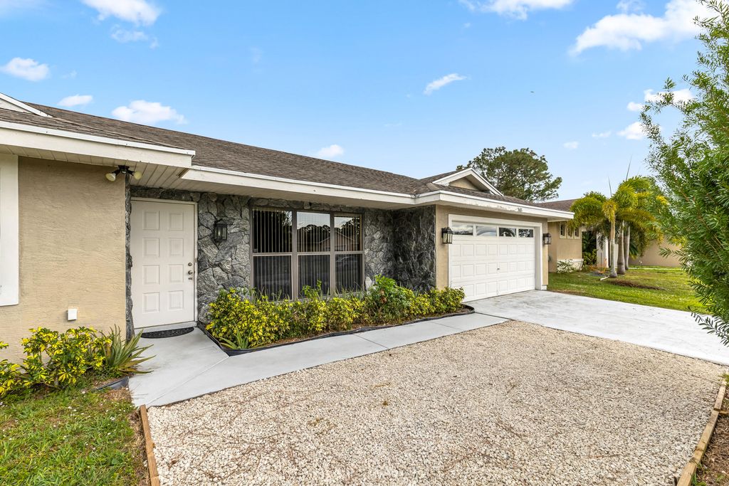 Photo of 3601 SW Margela Street, Port Saint Lucie, FL 34953 (MLS # R11063880)