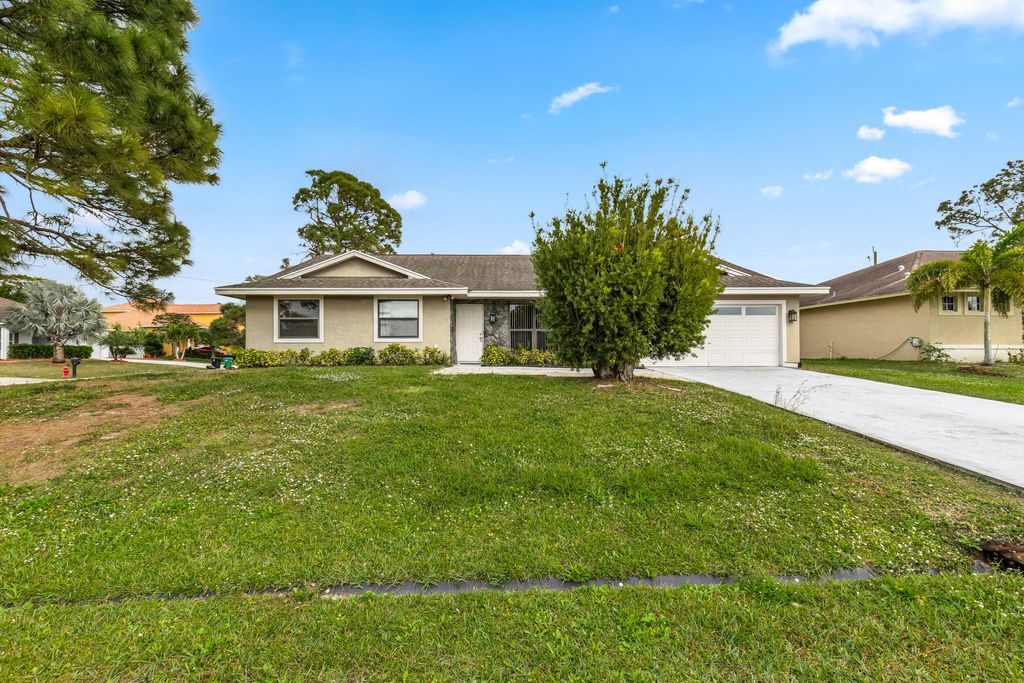 Photo of 3601 SW Margela Street, Port Saint Lucie, FL 34953 (MLS # R11063880)
