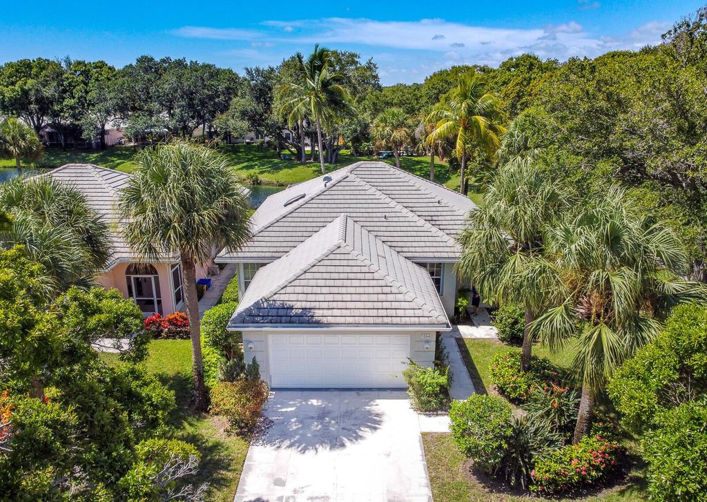 Photo of 1064 Bedford Avenue, Palm Beach Gardens, FL 33403 (MLS # R11005317)