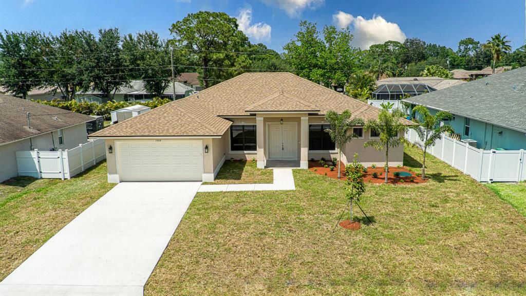 Photo of 1509 SW Fresno Road Rd, Port St Lucie, FL 34953 (MLS # R10709273)