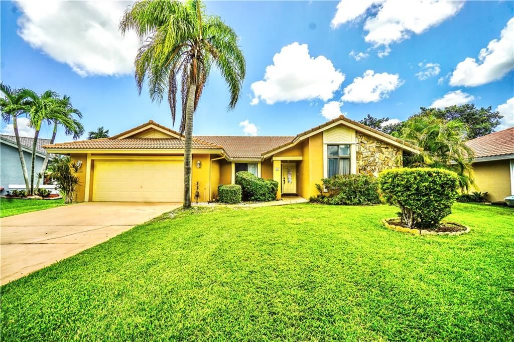 Photo of 4245 NW 73rd Way, Coral Springs, FL 33065 (MLS # F10301563)