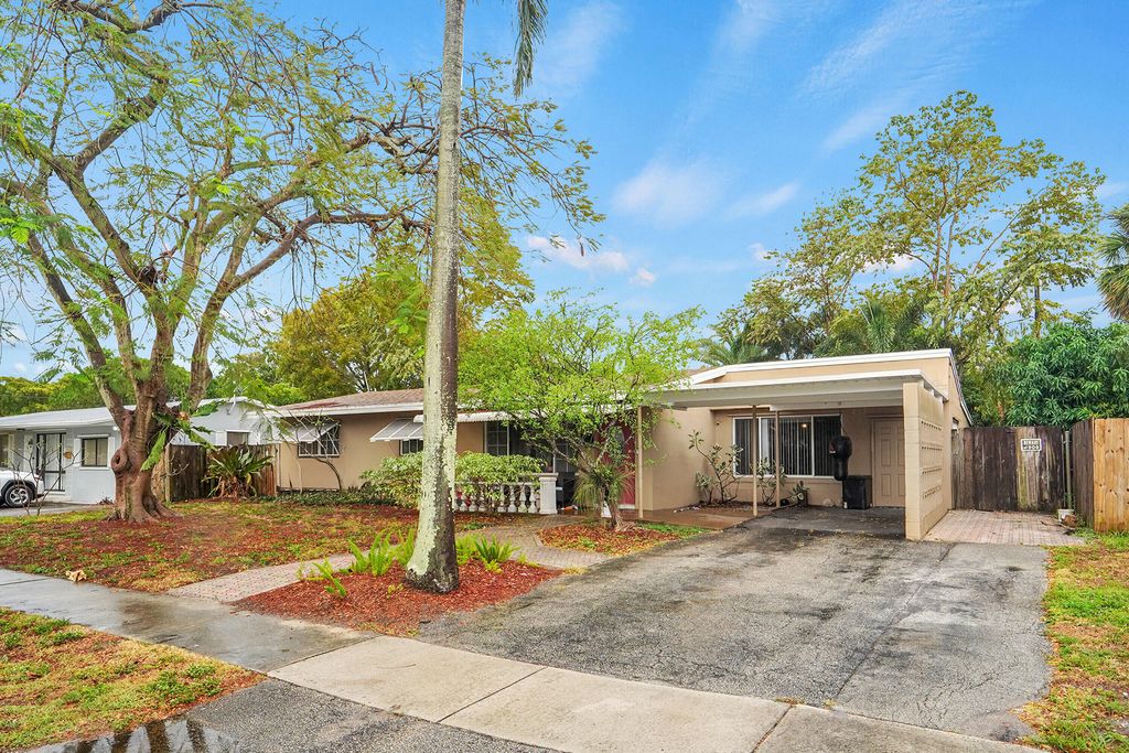 Photo of 720 NE 23rd Place, Pompano Beach, FL 33064 (MLS # B26002742)