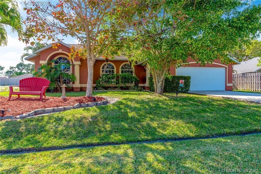 Photo of 2110 SE Bowie Street, Port Saint Lucie, FL 34952 (MLS # R10718002)