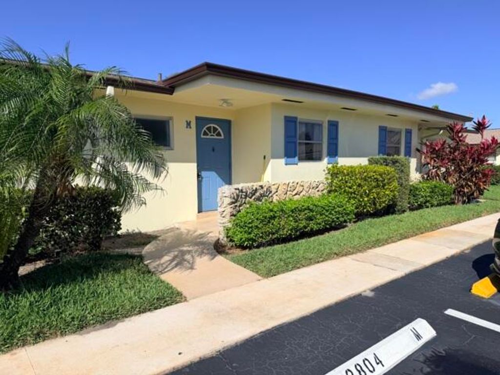 Photo of 2804 E Crosley Drive E #M, West Palm Beach, FL 33415 (MLS # B26001611)
