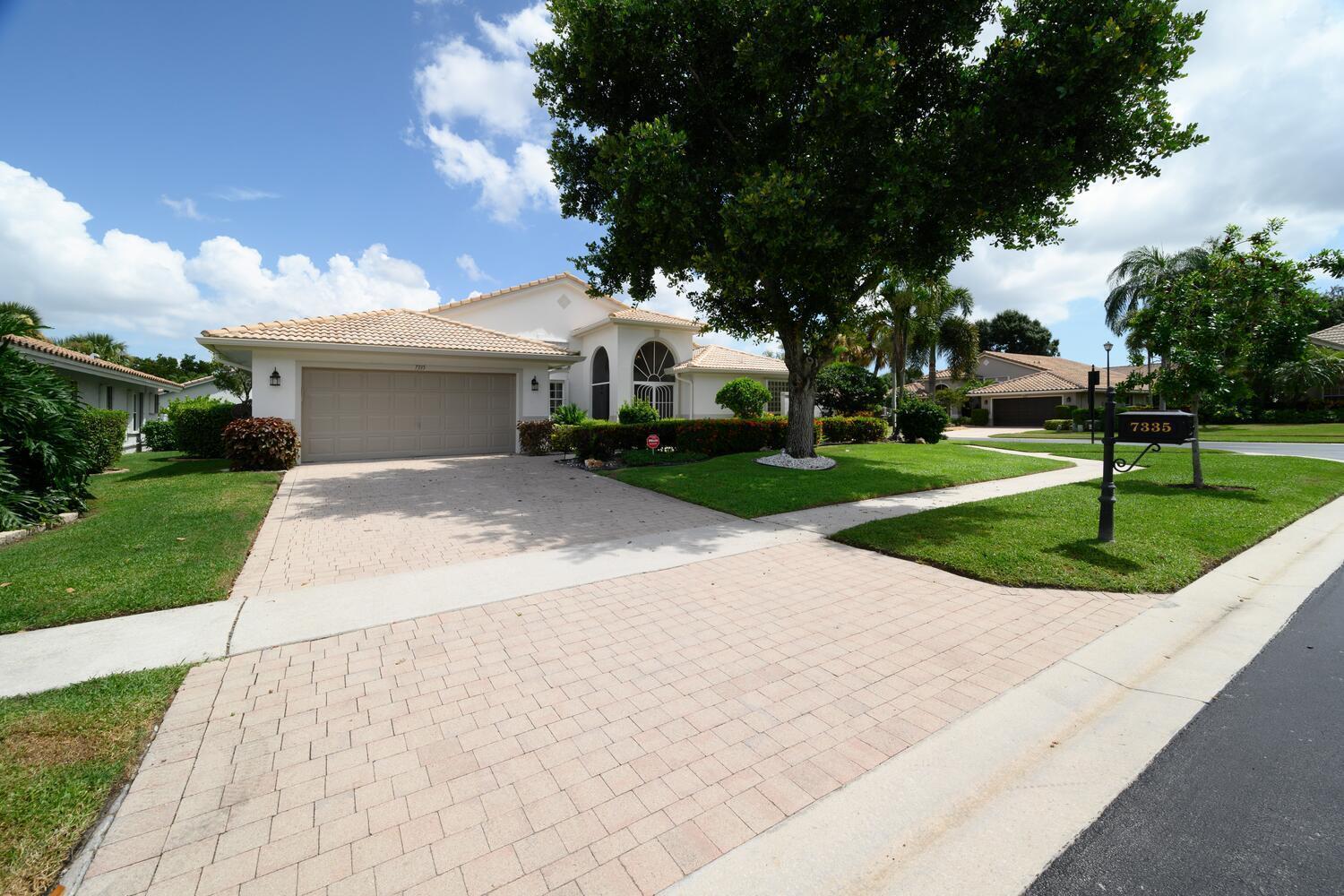 This stunning residence features 3 spacious bedrooms and 3 full bathrooms, situated on a desirable corner lot. The large yard is beautifully landscaped with luxurious touches, offering ample space for outdoor activities. Relax or entertain on the screened-in patio overlooking your private pool--a perfect oasis for year-round enjoyment. The large, open kitchen faces the pool area and is equipped with stainless steel appliances and granite countertop, making it ideal for cooking and casual gatherings. The home is partially furnished, included is all furniture for the three bedrooms, a stylish living room wall unit, and all the outdoor furniture, ready for you to move in and enjoy. The a/c and water heater are approximately 1 year old. No mandatory golf membership fee.