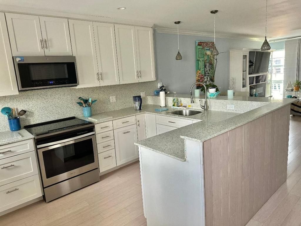 Photo of 3851 N Ocean Boulevard #204, Delray Beach, FL 33483 (MLS # R11011336)