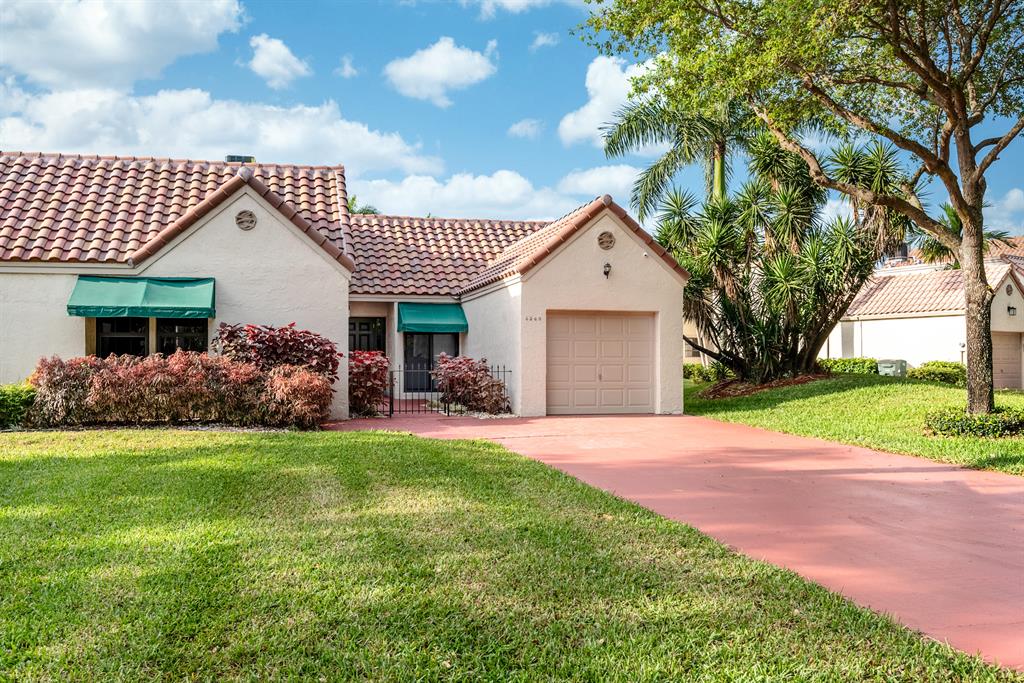 Beautifully updated 3 bedrooms, 2 full bathrooms, 1 car garage corner unit villa in sought after L'Ambiance. Updates include NEW A/C, new kitchen cabinets with granite counter tops, new tile in living areas and kitchen, new bathroom vanity in master bathroom with granite counter tops, new bathroom vanity in guest bathroom, new carpet in bedrooms, new light fixtures and hardware through out, and fresh interior paint. Other features include vaulted ceilings, large walk in closet in master bedroom, and an open patio to enjoy the backyard. A+ rated schools. Community offers 2 pools and tennis courts. Close to shopping, highways, and entertainment. Roof 2020.