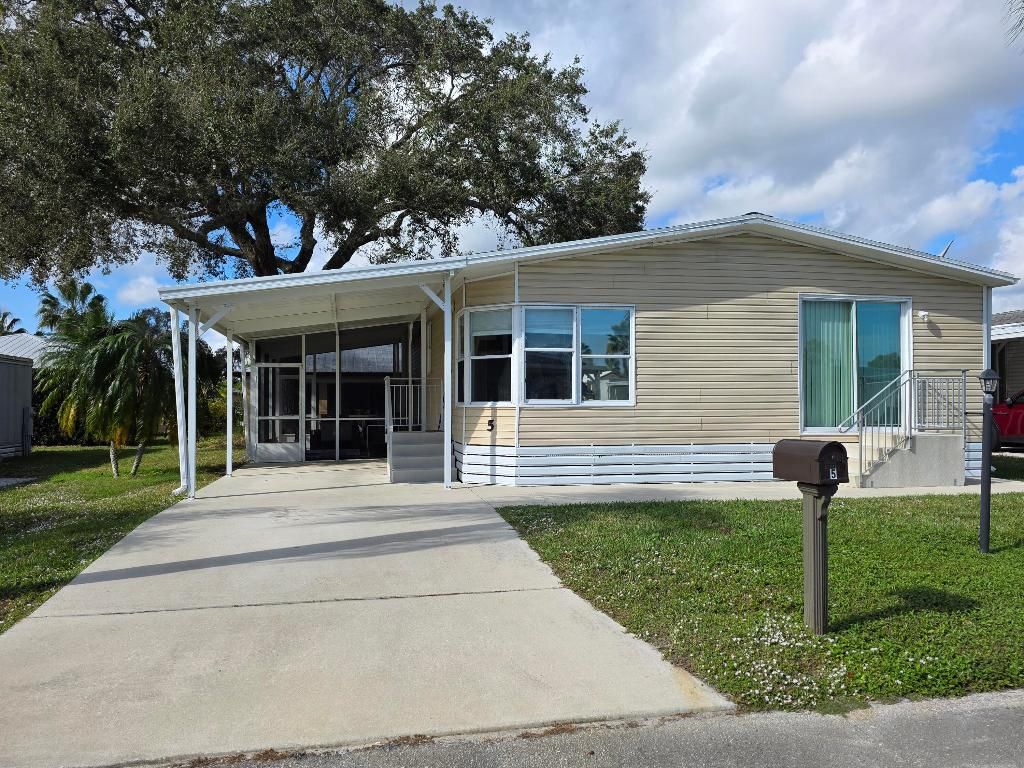 Photo of 5 Hermosa Lane, Port Saint Lucie, FL 34952 (MLS # R11149215)