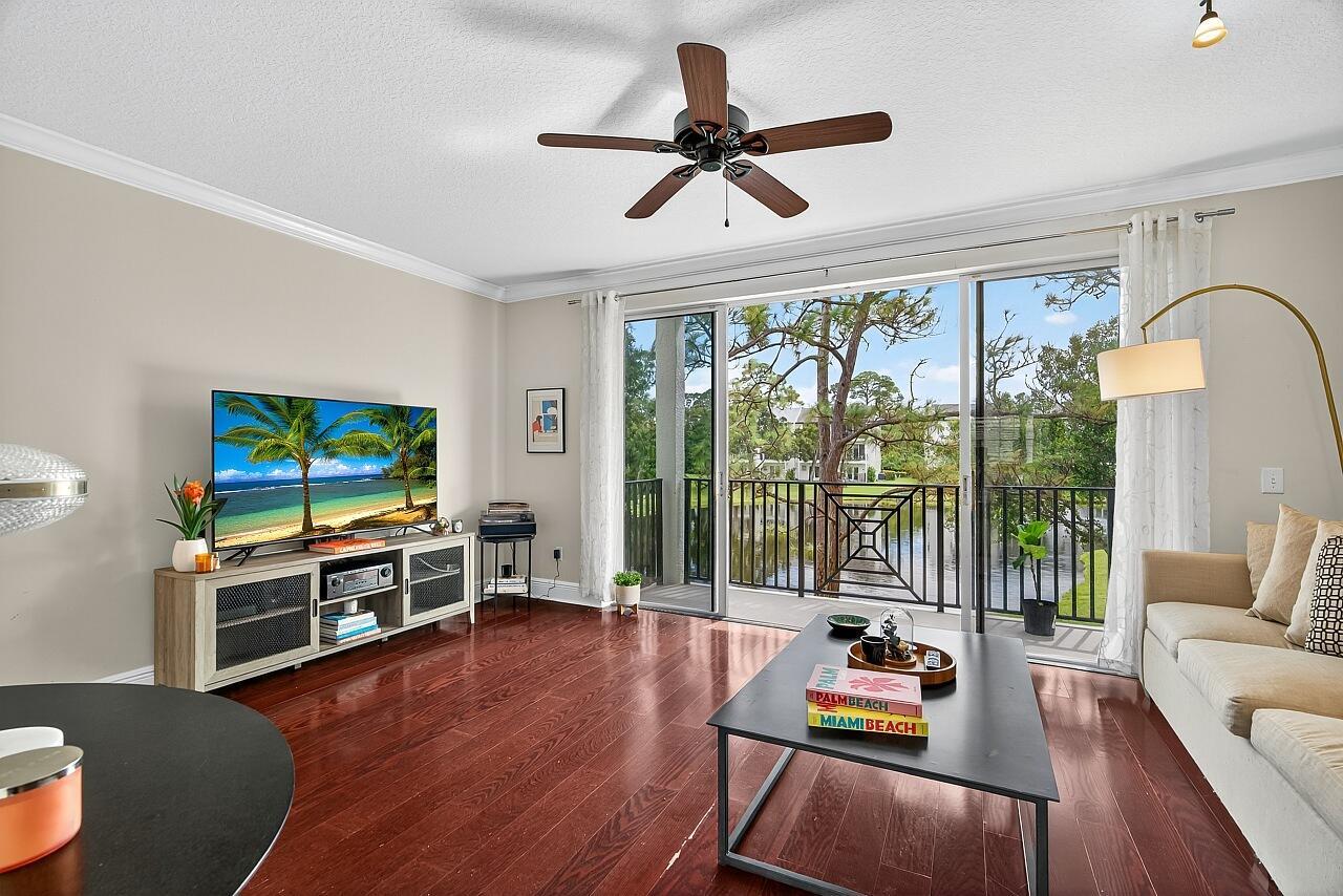 Ideal 2 bedroom suite plan! Main + Upper bedroom suites w/oversized living area in middle w/big eat in kitchen! Premiere end unit with long lake views + immense privacy! Wood floors, tray ceilings, bay window add panache, oversized closets, enclosed garage + close to all things Vero incl Leisure Square, schools + shops make for an ideal full time home, investment property or multi-gen house! Clubh w pool + fitness! Newly painted exterior! A unique plan + community with immense appeal + flexibility of use. Pets + rental 2x yr ok!