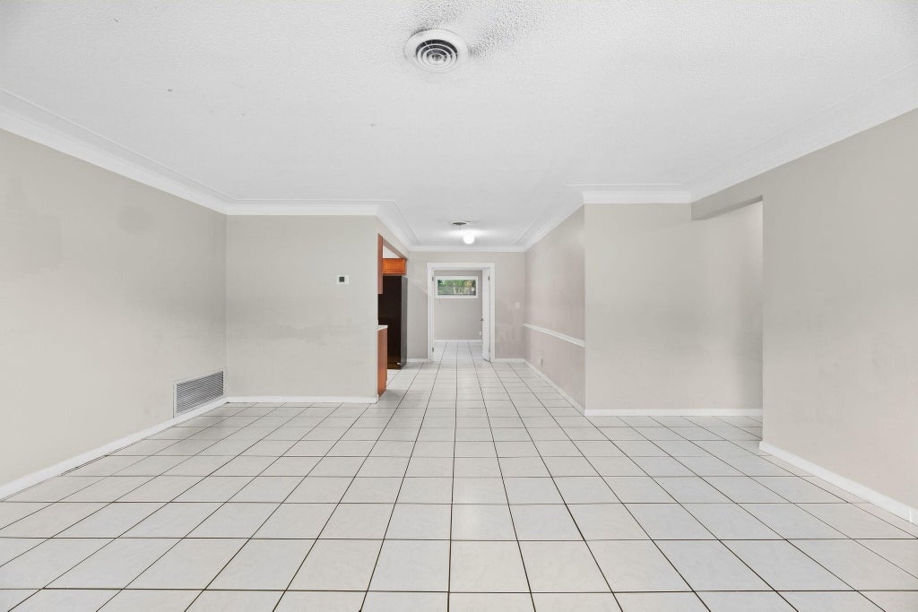 Photo of 831 NW 43RD Avenue, Coconut Creek, FL 33066 (MLS # B26081863)