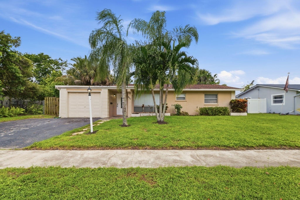 Photo of 831 NW 43RD Avenue, Coconut Creek, FL 33066 (MLS # B26081863)