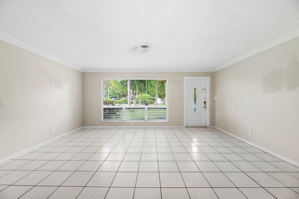 Photo of 831 NW 43RD Avenue, Coconut Creek, FL 33066 (MLS # B26081863)