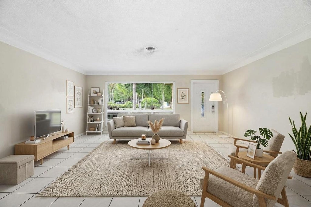 Photo of 831 NW 43RD Avenue, Coconut Creek, FL 33066 (MLS # B26081863)