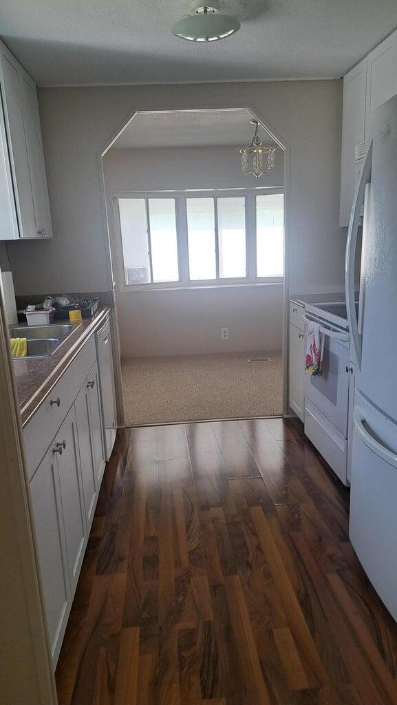This is a manufactured in a 55+ community. Its located in the pet section, Spanish lakes is a golfing community, clubhouse activities ,swimming pools ,tennis and MUCH MORE!!