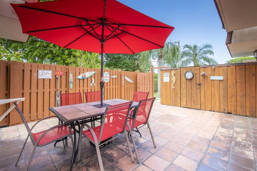 Fabulous opportunity!  Great 2 bedroom with 2 ensuites plus a half bath downstairs, dining area off the kitchen and a living room opening onto a fenced courtyard with a storage shed.  Roof installed 2022.  Wonderful and well maintained smaller community with pool, across from John Prince Park and a short drive to shopping, downtown restaurants and the beach.  No rentals, everyone here is an owner-occupant, 2 pets up to 20lbs allowed, 2 parking spaces.  Very affordable maintenance fees.