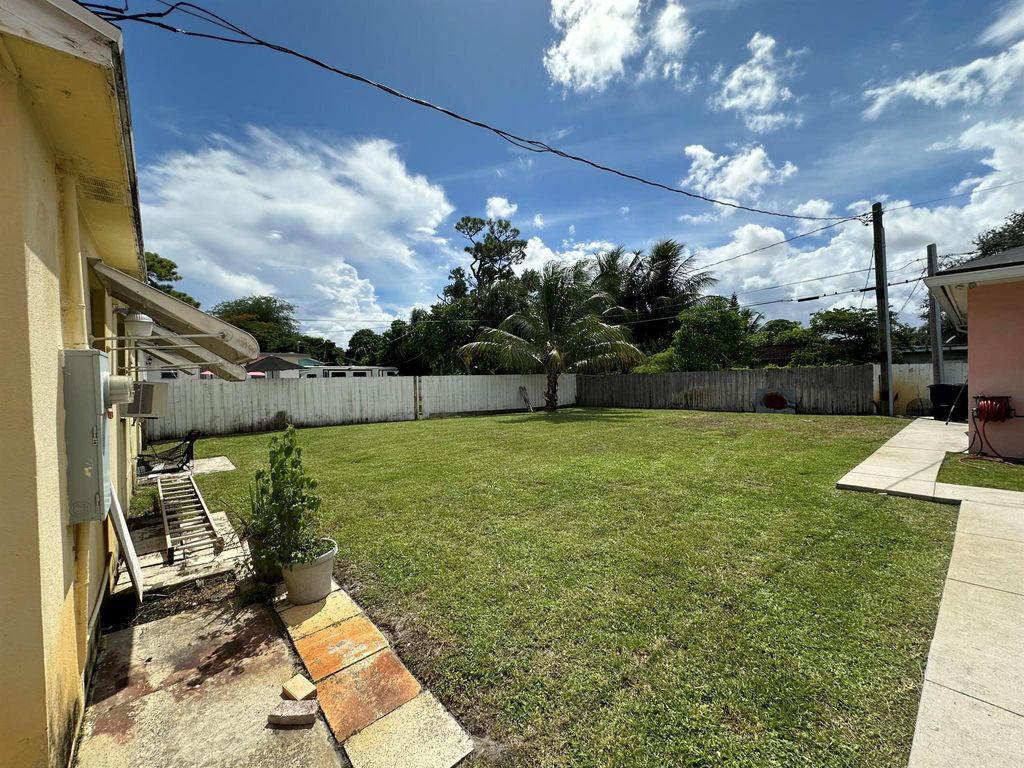 Photo of 3825 Edwards Avenue, Lake Worth Beach, FL 33461 (MLS # R11032215)