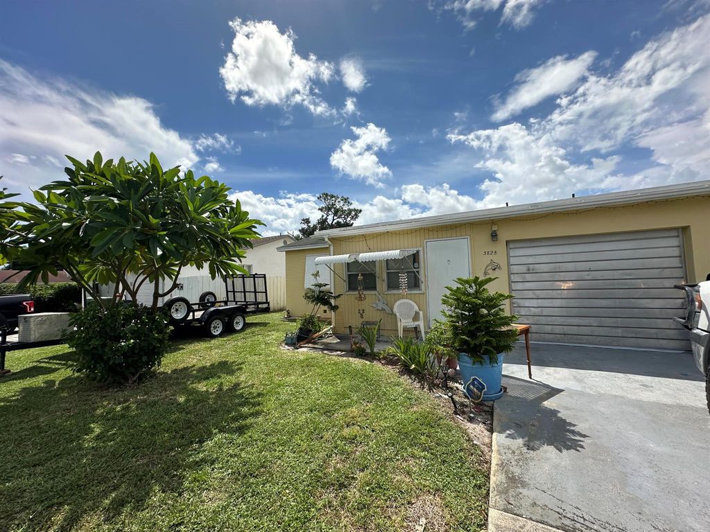 Photo of 3825 Edwards Avenue, Lake Worth Beach, FL 33461 (MLS # R11032215)