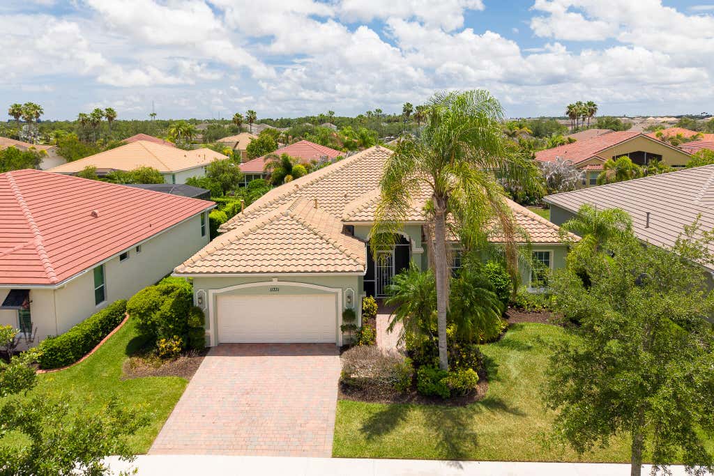 Photo of 11331 SW Aspen Lane, Port Saint Lucie, FL 34987 (MLS # B26040944)