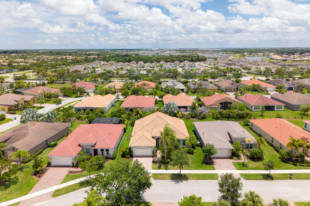 Photo of 11331 SW Aspen Lane, Port Saint Lucie, FL 34987 (MLS # B26040944)