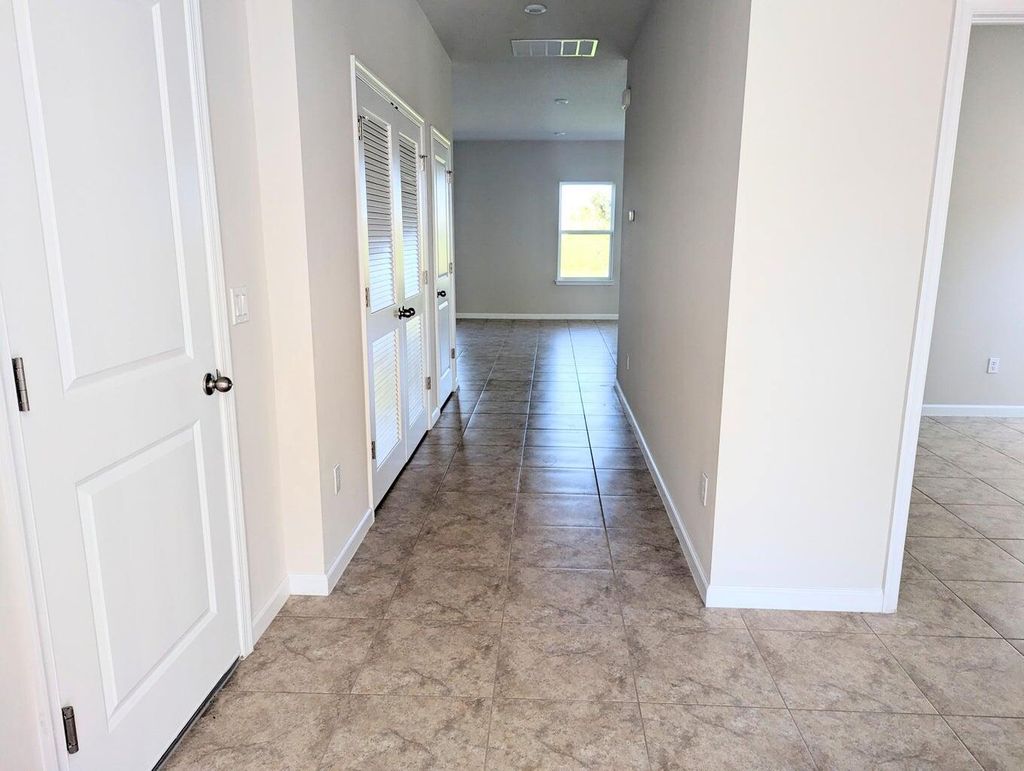 Photo of 10651 SW Vasari Way, Port Saint Lucie, FL 34987 (MLS # R11001035)