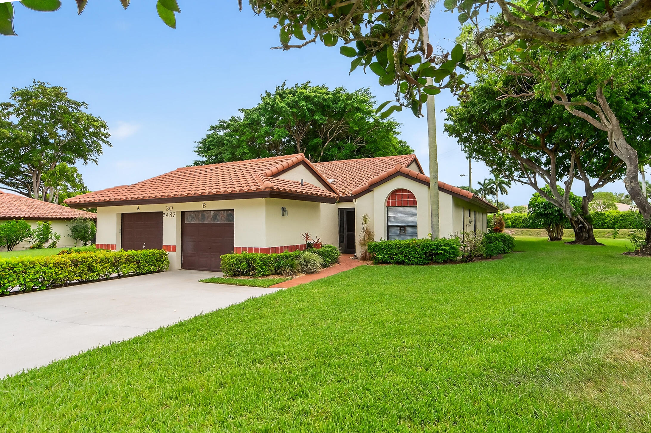 Welcome to Palm Chase, a vibrant 55+ gated community of 350 homes in Boynton Beach! This UPDATED spacious 3BR + office, 2BA villa with garage offers an open layout, vaulted ceilings, skylights, and chefs kitchen. Enjoy a bright Florida Room and private patio--perfect for relaxing or BBQs. The primary suite features a walk-in closet and walk-in shower. Full-size washer and dryer included. Resort-style amenities: Olympic-size temperature-controlled pool, hot tub, tennis, pickleball, fitness center, clubhouse, and walking paths. With the HOA handling exterior care including roof, you can spend more time enjoying life--just minutes from beaches, shopping, dining, and everything Palm Beach County has to offer. Here, every day feels like a vacation! Buyer to verify all info.