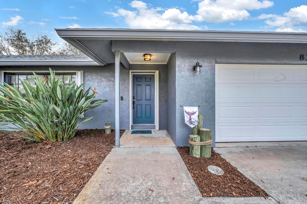 Photo of 834 SE Roulette Lane, Port Saint Lucie, FL 34983 (MLS # R10926798)