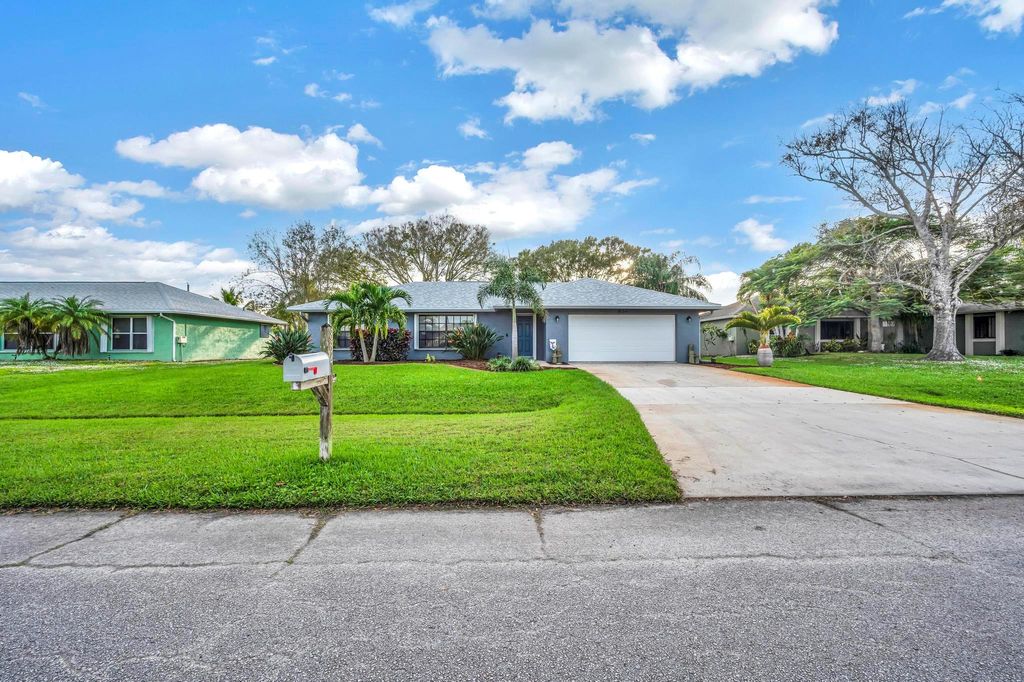 Photo of 834 SE Roulette Lane, Port Saint Lucie, FL 34983 (MLS # R10926798)