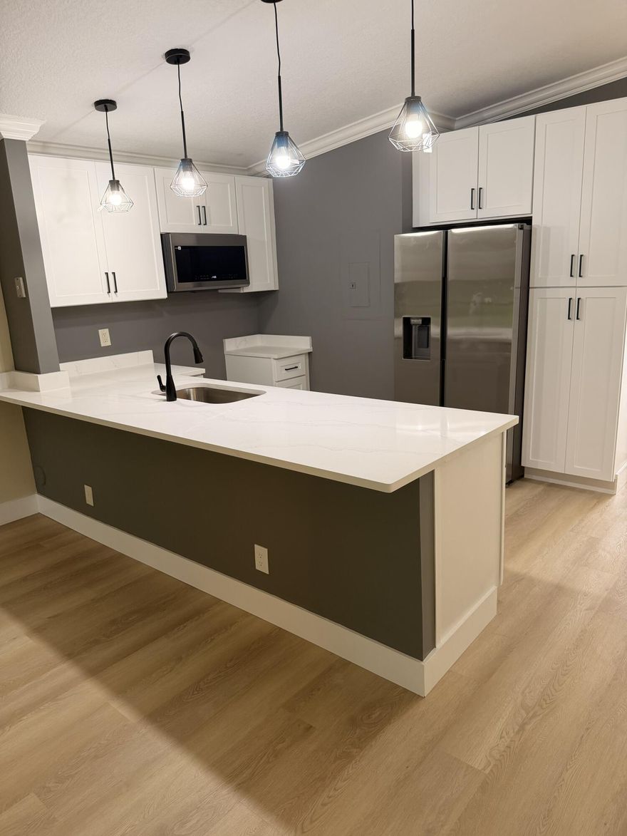 Fully renovated beautiful 3/2 villa in Timberwalk II /Loggers Run, single-story villa features an open airy layout with vaulted ceilings, crown moldings & spacious living area. Enjoy the extra-large screened patio off living room & primary bedroom, ideal for outdoor dining or relaxing while enjoying the serene surroundings of lush green space with ultimate privacy. Fully renovated kitchen with brand-new appliances. Enjoy resort-like amenities, community pool, tennis, and walking paths. With its prime location, this villa offers easy access to top-rated schools, shopping, dining and much more!