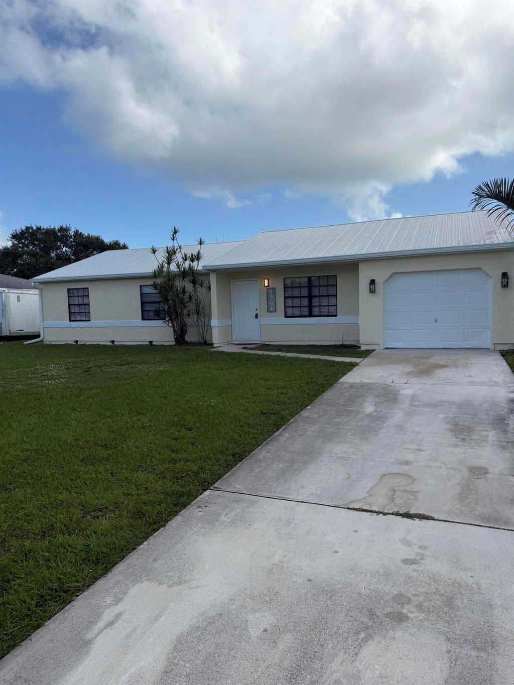 Photo of 1561 SE Arenson Lane, Port Saint Lucie, FL 34952 (MLS # R11135576)