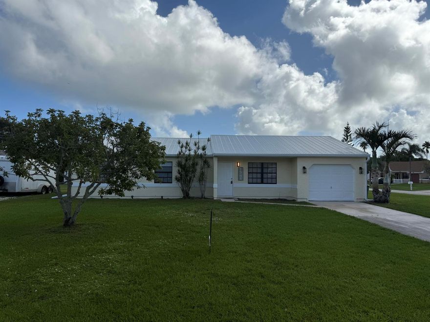 Charming 3-bedroom, 2-bath home East of US-1! Located on a spacious corner lot with an inviting floor plan. Minutes from beaches, shopping, dining, parks, and medical centers -- the perfect place to call home!