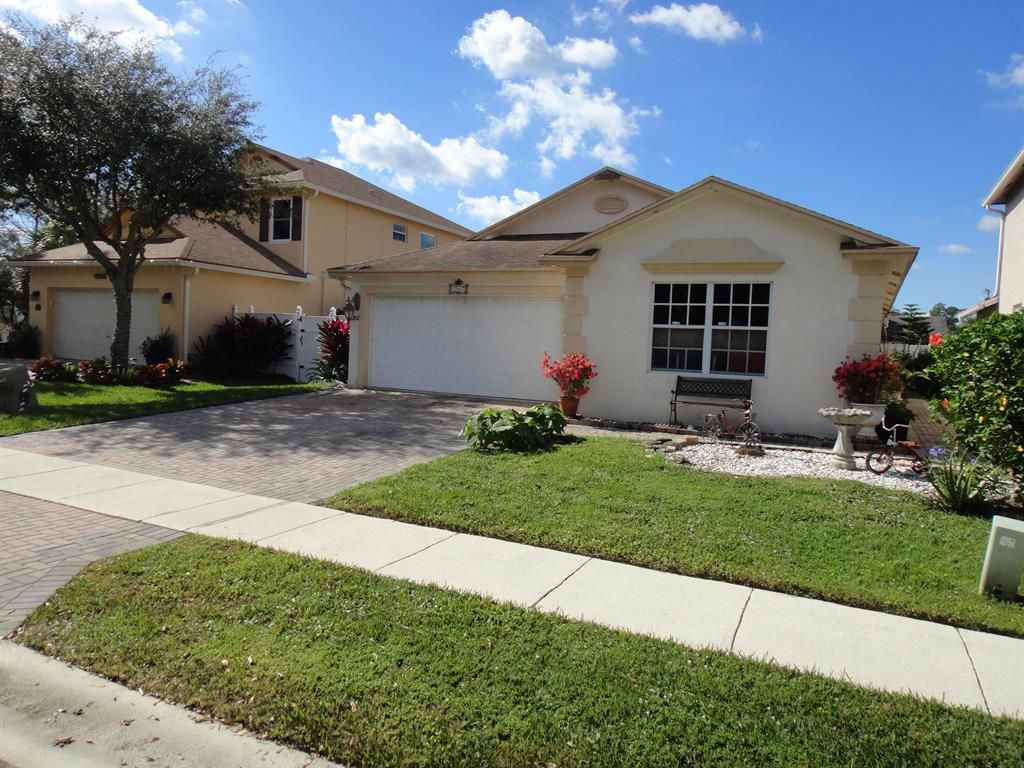 Photo of 1267 Winding Rose Way, West Palm Beach, FL 33415 (MLS # R10767297)