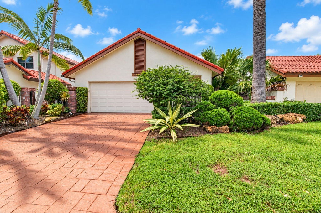 Photo of 21676 Club Villa Terrace, Boca Raton, FL 33433 (MLS # B26067658)