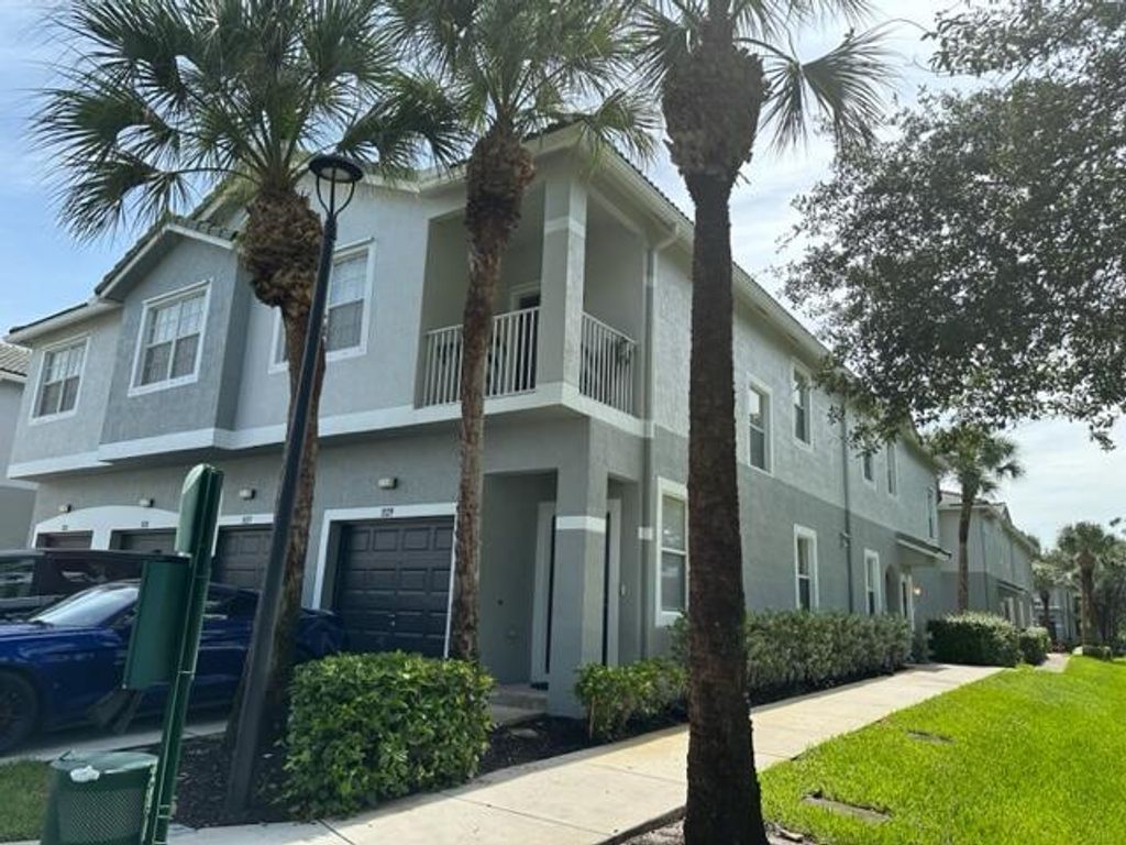 Photo of 3129 Grandiflora Drive, Greenacres, FL 33467 (MLS # R10898867)