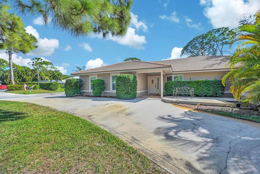 Rare opportunity! Own a stunning 3 bed 2 bath pool home on a spacious 0.4+ acre corner lot in the exclusive, gated, River Landing community in Palm City. This home has been meticulously cared for. Enjoy a private boat storage area, a community boat ramp with direct ocean access, and tennis courts for an active lifestyle--perfect for boating and sports enthusiasts! Recent updates shine throughout, including a luxurious master bath, recently painted interior and exterior, newer appliances, updated impact windows for added safety and energy efficiency, and beautifully landscaped. Ideally located near both I-95 and Florida's Turnpike for easy commuting. Live the Florida lifestyle you've always dreamed of--this is the one you've been waiting for.