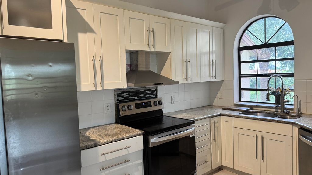 Photo of 5243 Europa Drive #J, Boynton Beach, FL 33437 (MLS # R11136182)