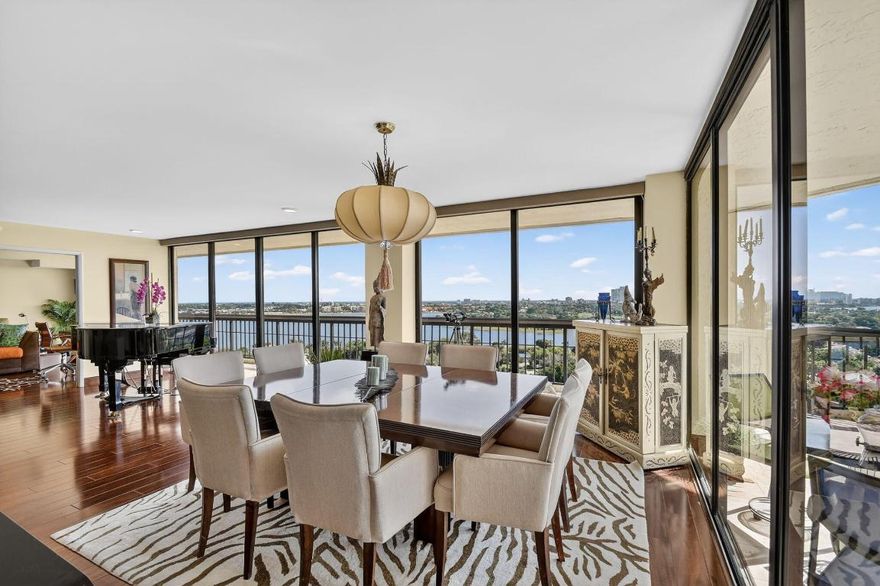 OCEAN & LAKE VIEWS - RARE CORNER 3BR ON THE 16TH FLOOR — FULL RENOVATION, EAST & SOUTH EXPOSURES.  Floor-to-ceiling sliders open to a wraparound balcony capturing ocean, Palm Beach, and city skylines. A custom chef's kitchen features Sub-Zero refrigeration, induction cooktop, dual-sink prep area, and wine/Champagne cooler. The flexible office converts to a true 3rd bedroom. The private primary suite offers two walk-in closets and a spa-style bath with heated jacuzzi and rain shower. Additional upgrades include new AC, enhanced hot-water delivery, and a premium steam washer/dryer. Perched in a 24-hour gated community east of I-95, offering concierge services, a heated pool, fitness center, tennis, pickleball, party room and covered parking #49.