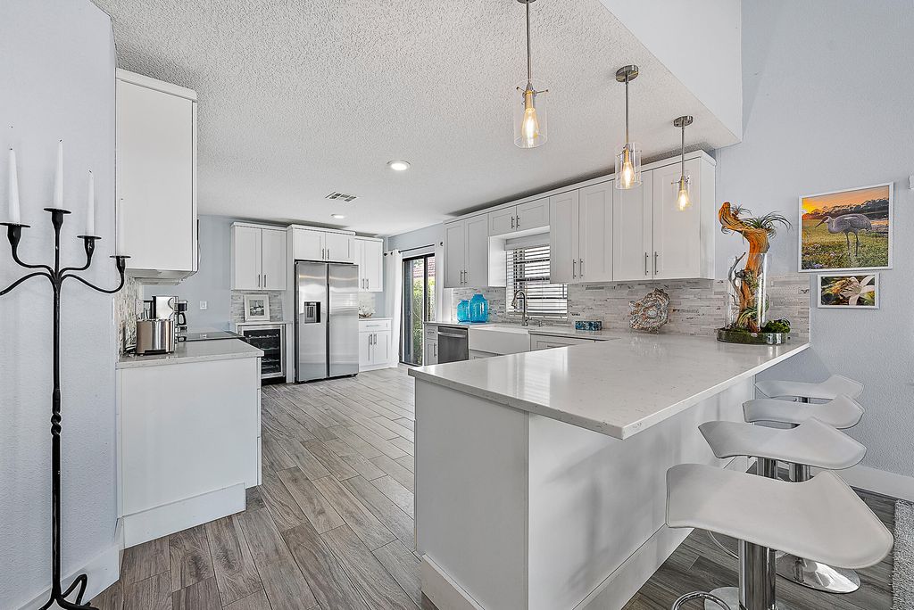 Photo of 2596 La Cristal Circle, Palm Beach Gardens, FL 33410 (MLS # R11137472)