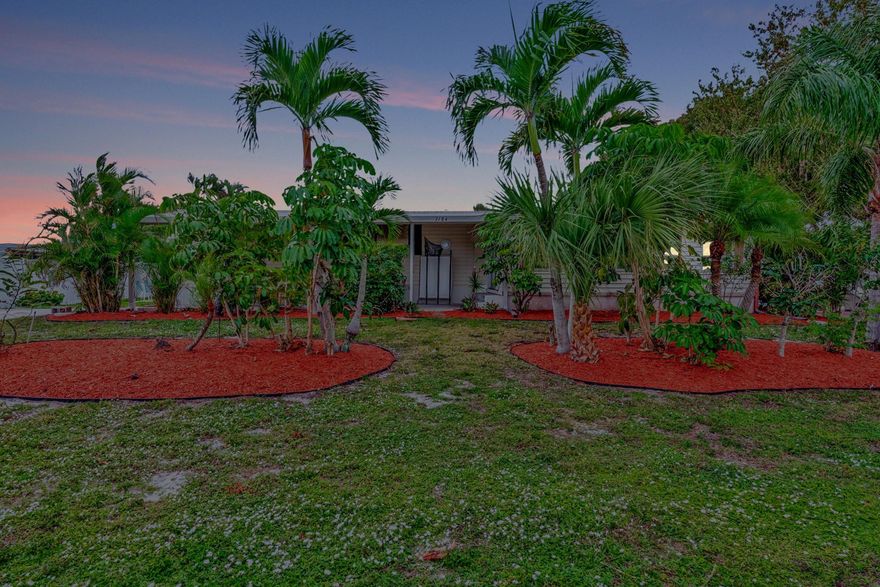No HOA, Own Land, Corner Lot , not 55+, This is a fabulous Hobe Sound community with Clubhouse heated pool, shuffleboard, library and billiards, and more available for a yearly fee.  Mature landscaping adorns this corner lot home for additional privacy with two driveways and plenty of storage for a boat or rv with no restrictions. Home has a welcoming screened entry perfect for an indoor / out retreat. 2 Bedrooms and 2 updated  Bathrooms .  Eat in kitchen, livingroom, and large bonus room to fill many different needs. Multiple outdoor areas for relaxing and enjoying the Florida sunshine or shade. Don't miss this great opportunity to live in Hobe Sound. Very short distance to Publix.  Few miles  to the Beach, and downtown Hobe Sound. Fabulous Florida lifestyle!