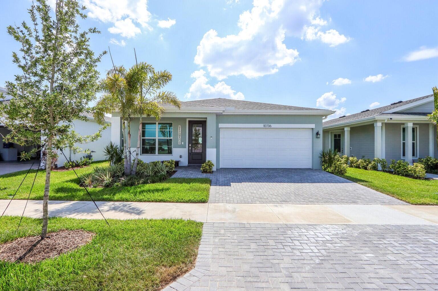 Welcome to this stunning property, a true gem nestled in the heart of the vibrant Port St. Lucie. This meticulously maintained home offers a harmonious blend of modern elegance and timeless charm, providing an unparalleled living experience. The open-concept design flawlessly combines the living, dining, and kitchen areas, creating a seamless flow perfect for entertaining guests or spending quality time with family. 3 Bedrooms and 2.1 baths. Step outside to discover a landscaped backyard. The patio area is perfect for a fresco dining, while the lush green lawn offers plenty of space for outdoor activities and gardening enthusiasts. Conveniently located, this property sees itself near shopping centers, schools and recreational facilities. VACANT EASY TO SHOW.