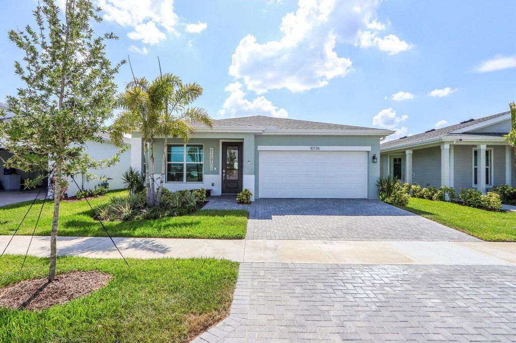 Photo of 10736 SW Estella Lane, Port Saint Lucie, FL 34987 (MLS # R11070277)