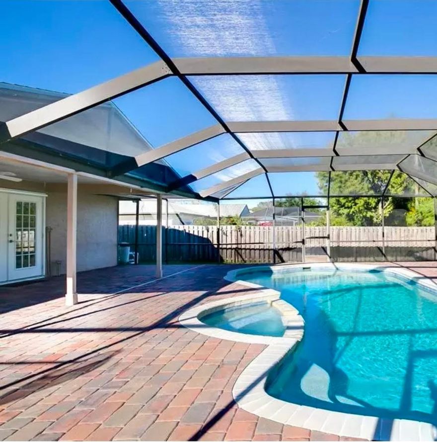 ****PRICED TO SELL****New Roof (2025) | Private Pool | Move-In Ready. Escape to your own private retreat at 2471 SE Wald St! This 3-bedroom, 2-bathroom home offers the perfect blend of comfort and security, featuring a brand-new roof and a new water heater for years of maintenance-free living. Kitchen with soft close wood cabinets and granite countertop. The open interior flows seamlessly to a screened-in pool area, ideal for year-round entertaining. Hurricane Shutters for added weather protection.  No HOA means you have the freedom to enjoy your property to the fullest. This Port St. Lucie gem is ready for its next owner!MORE PHOTO TO COME!