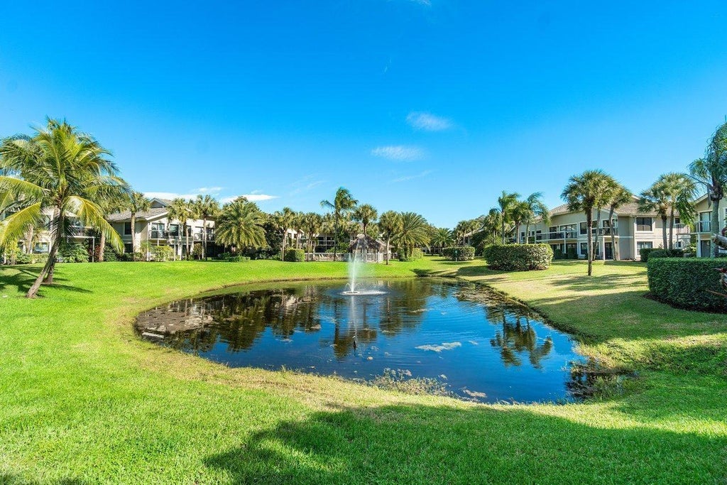 Photo of 11863 Wimbledon Circle #445, Wellington, FL 33414 (MLS # B26040264)