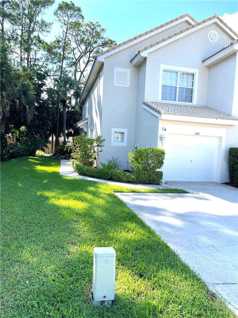 Photo of 1144 Woodfield Court, Greenacres, FL 33415 (MLS # F10532135)