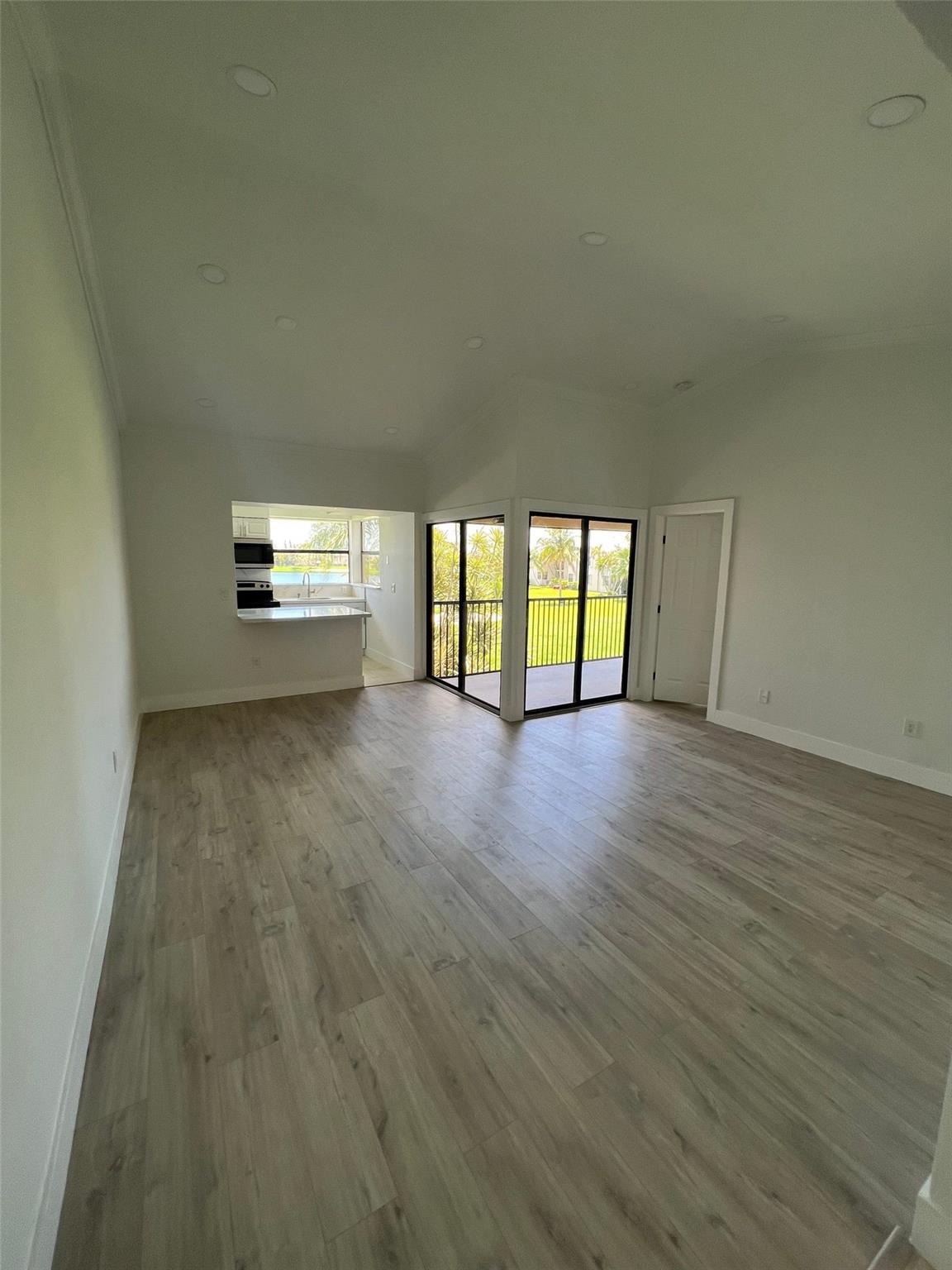 ONLY FIRST MONTH + 1x SECURITY DEPOSIT TO MOVE IN! Make this beautiful renovated 1bed/1bath condo with a stunning lake & beach view your next home! It is bright & spacious thanks to the volume ceilings & east-facing windows & doors. Wake up to expansive water views from every room or from your large balcony! Brand new features include: vinyl floors, paint, LED lighting, kitchen cabinets w/ granite countertops & SS appliances, AC unit, bathroom vanity & tile & newly installed washer/dryer. 1 parking space + plenty of guest parking. Gated community w/ clubhouse, multiple lakes (catch & release fishing okay), 2 pools, playground, basketball courts, lakeside walking paths & beach pavilion. Minutes from Turnpike, US1, FL Keys, Outlet Mall, Baptist Hospital, schools & restaurants.